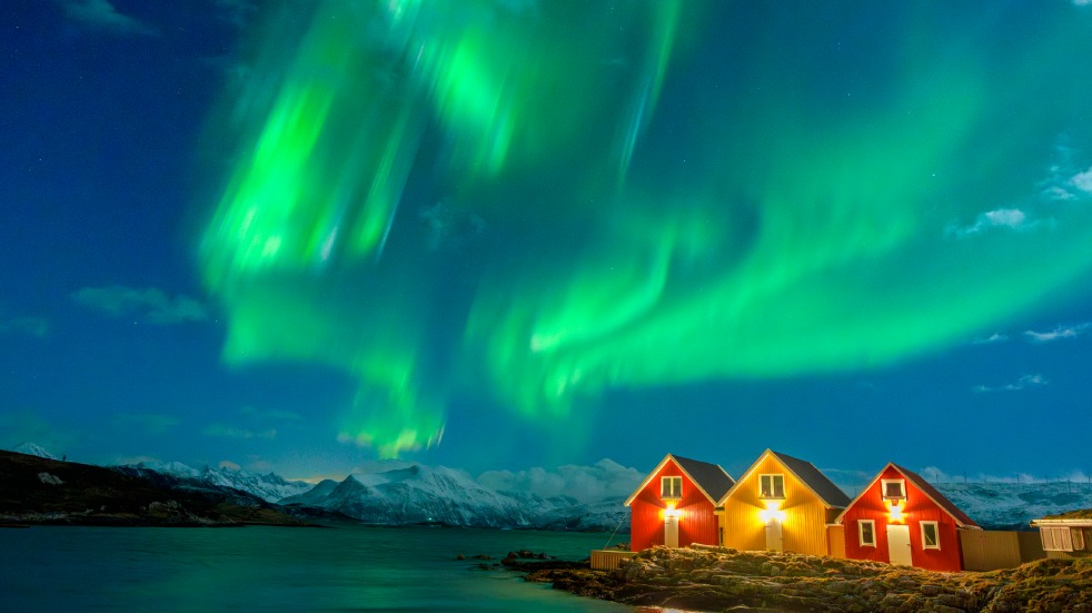 Northern Lights Norway with red houses